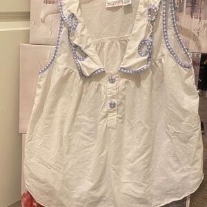 White Sleeveless Top with Blue Trim